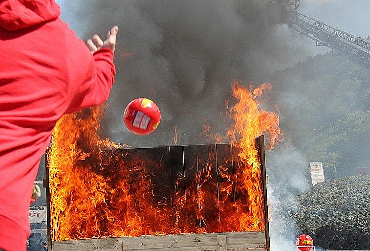 Elide Fire Extinguisher Ball Thrown into a burning crate.